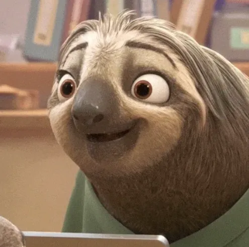 The DMV sloth from Zootopia, Flash, slowly breaking into a smile.